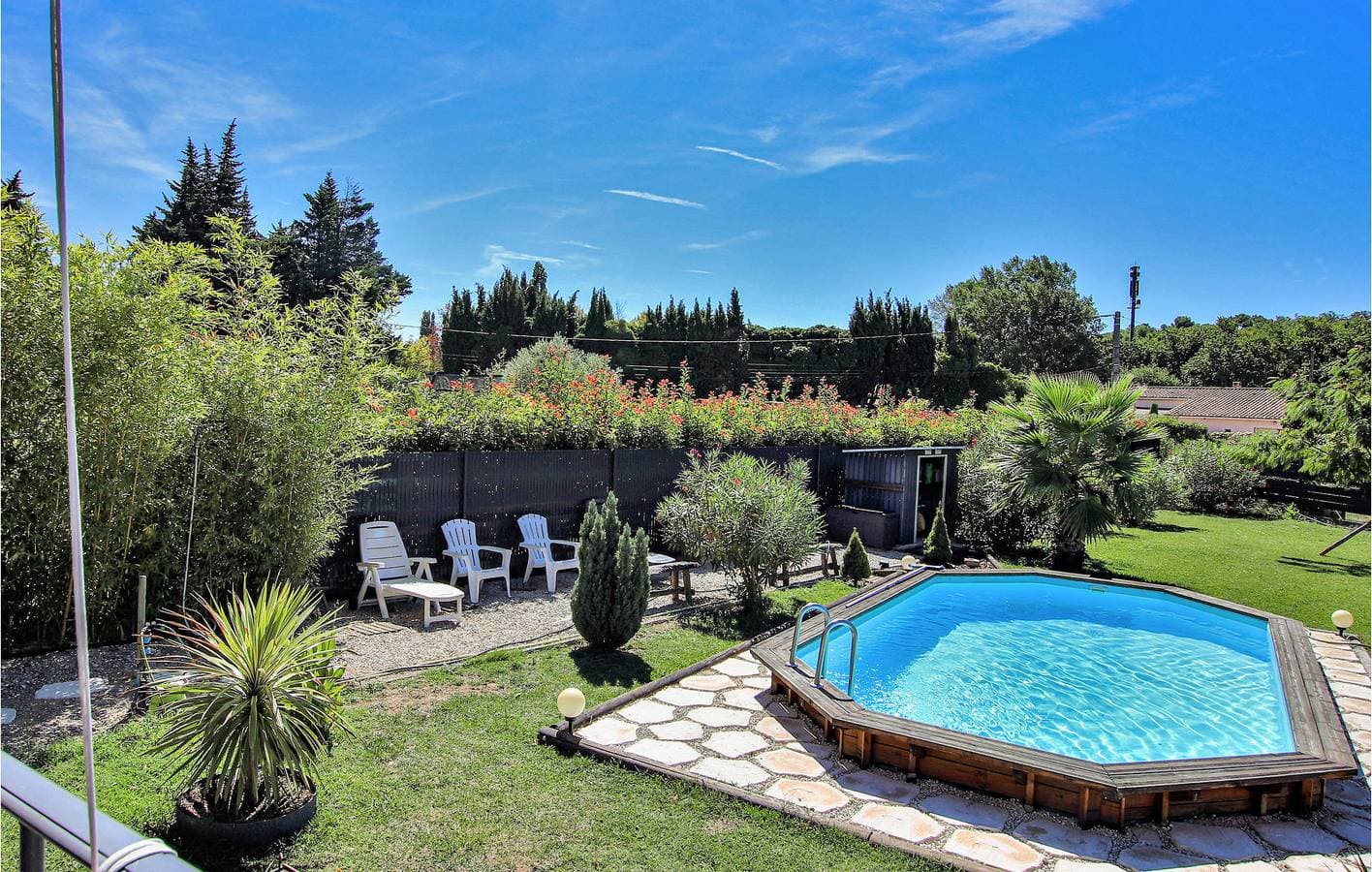 Foto 12 von 24: Klimatisierte Wohnung mit Pool und Garten