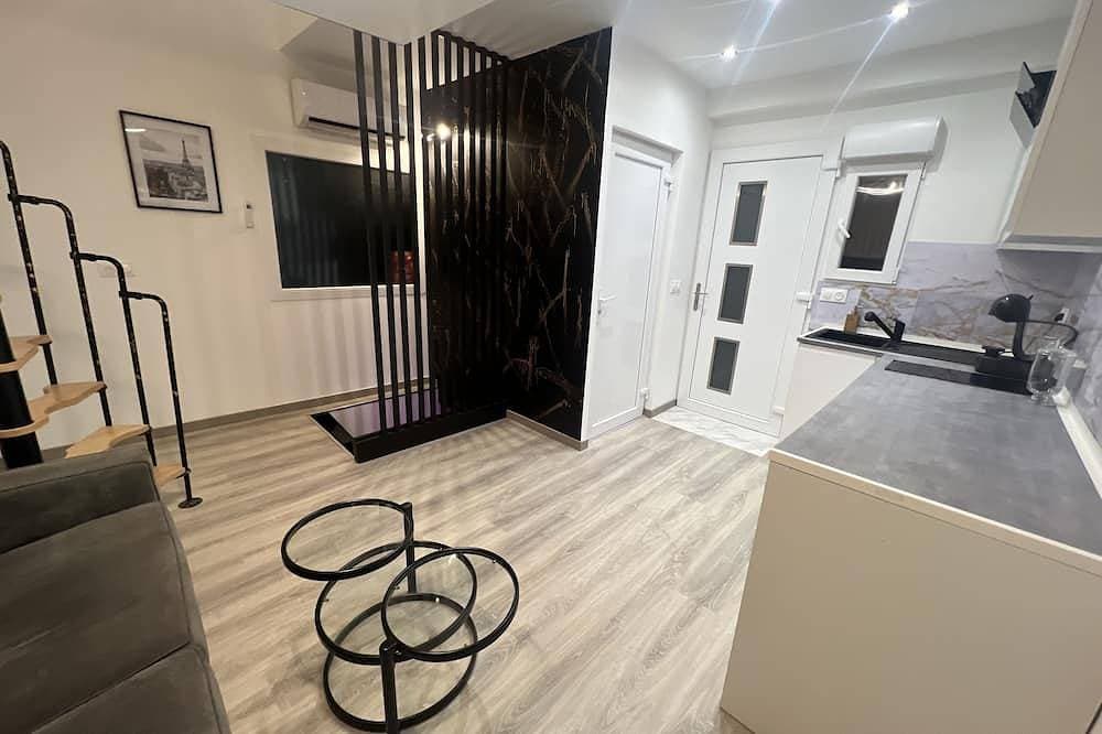 Foto 13 von 13: Maison Appartement Triplex Avec Jacuzzi et Sauna