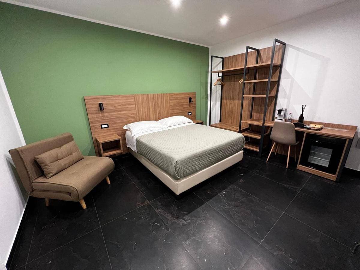 Foto 4 von 5: Triple Room with Private Bathroom