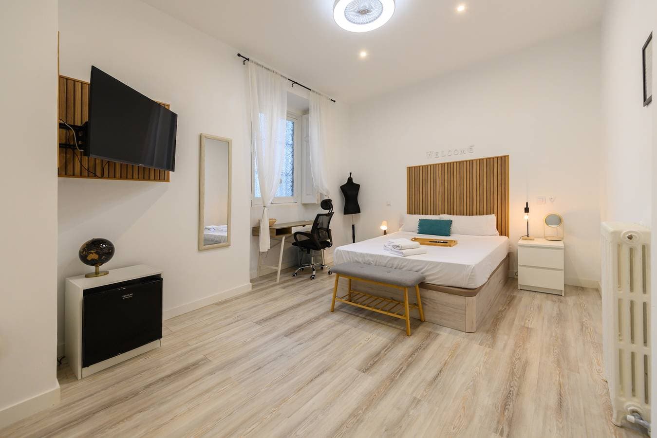 Foto 12 von 23: M Madrid: habitación con comodidad y zona