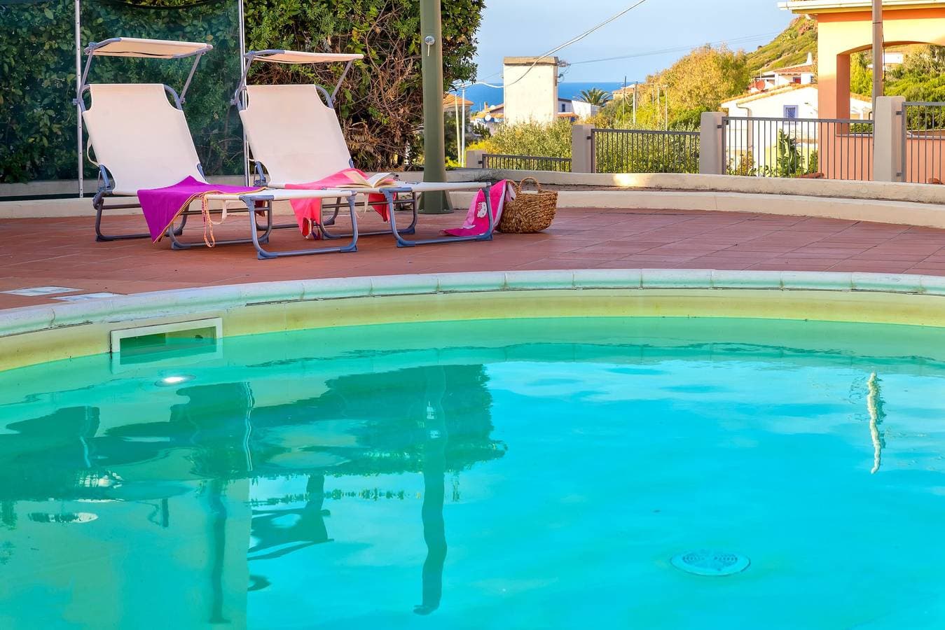 Foto 4 von 26: Ferienwohnung 'Gio's' mit Gemeinschaftspool, privatem Garten und Klimaanlage