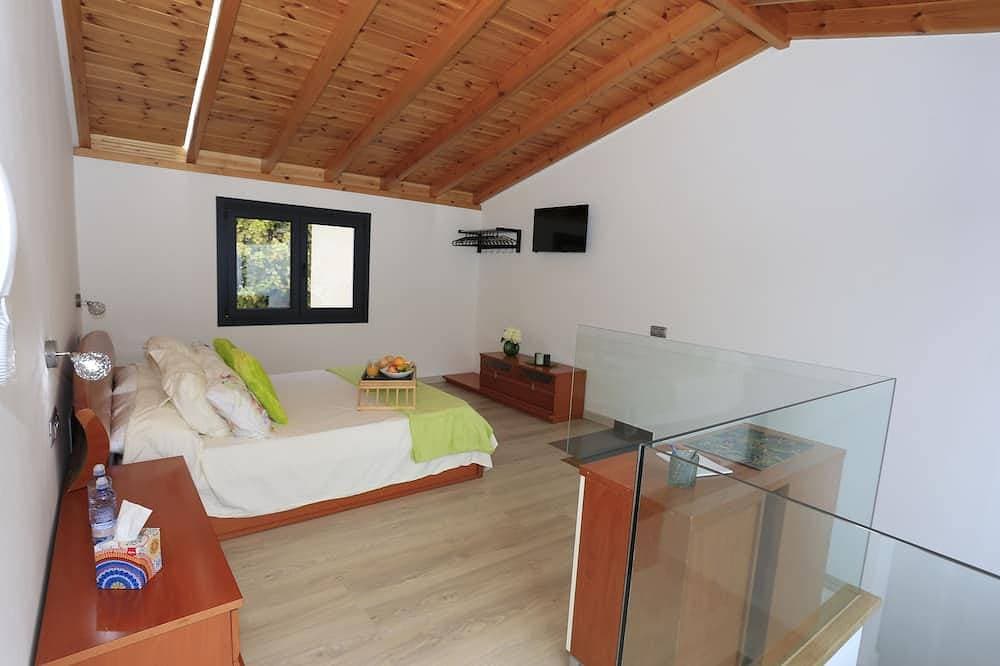 Foto 8 von 30: Einzelhaus mit 3 Schlafzimmern, 3 Bädern, Wohnzimmer, Küche, Garten