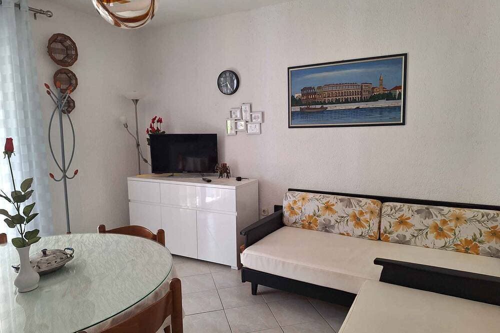 Ferienwohnung mit Klimaanlage und Terrasse 1