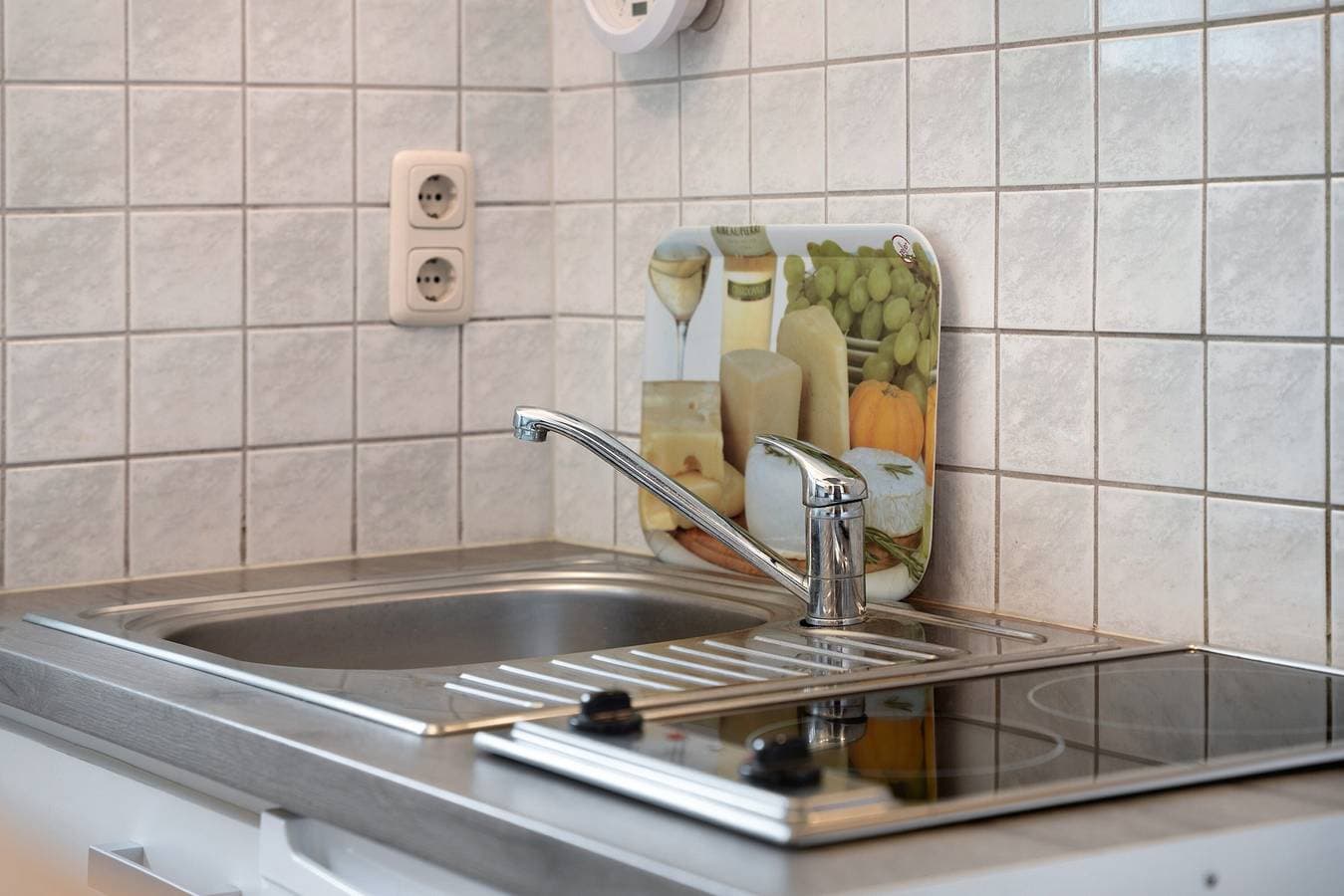 Foto 10 von 19: Einzimmerapartment 'Bäckerhus - Ferienwohnung 3' mit Gemeinschaftsterrasse und Garten