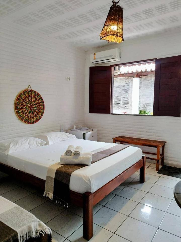 Foto 6 von 22: Triple Room with Bathroom