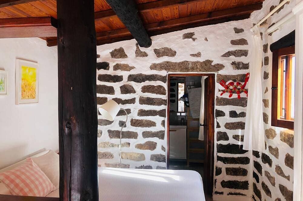 Foto 4 von 21: Cabaña en zona tranquila con bonitas vistas, acogedor estilo y cuidado jardín.