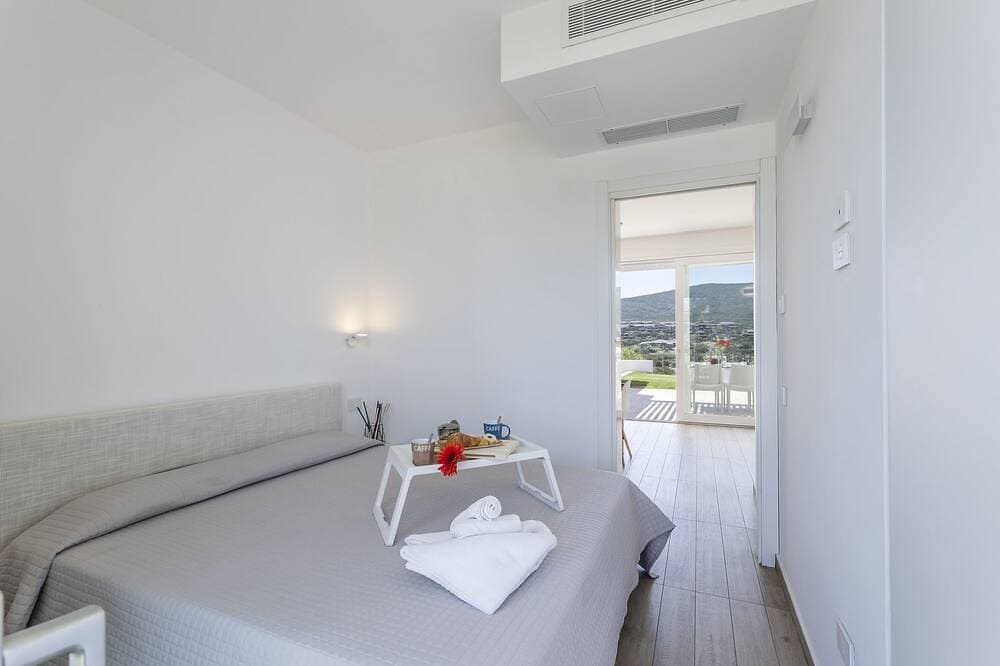 Foto 2 von 30: Capo Falcone Charming Apartment