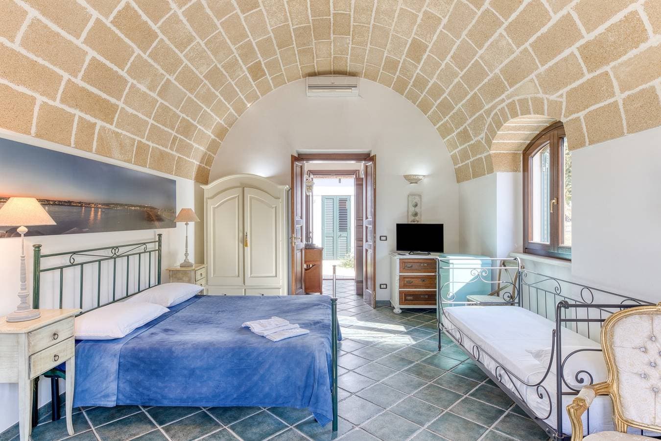 Foto 6 von 25: Ferienwohnung 'Agriturismo Le Baccole - Apt' mit privater Terrasse, Garten & Klimaanlage
