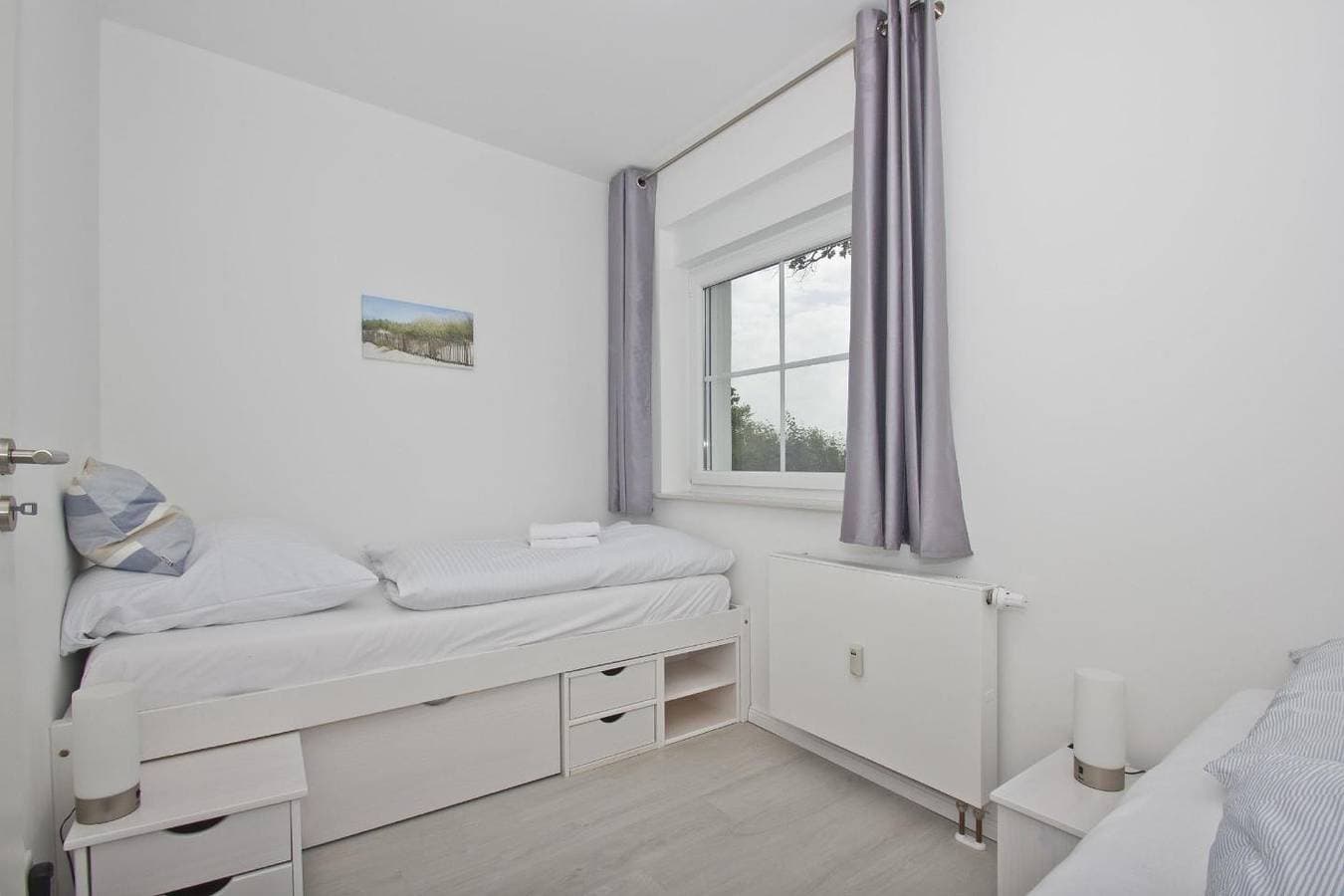 Foto 9 von 20: Moderne Ferienwohnung mit eigener Terrasse - Haus Inselwind FeWo MEERglück