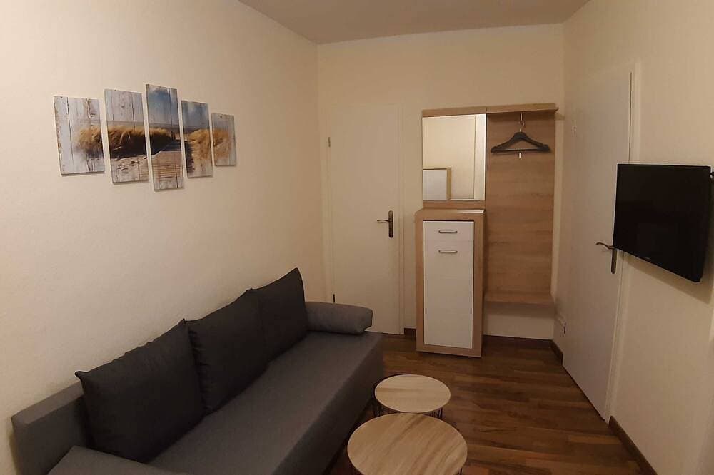 Foto 9 von 20: Fewo Smillenzweg 23qm - Ferienwohnung Smillenzweg mit eingezäunten Garten