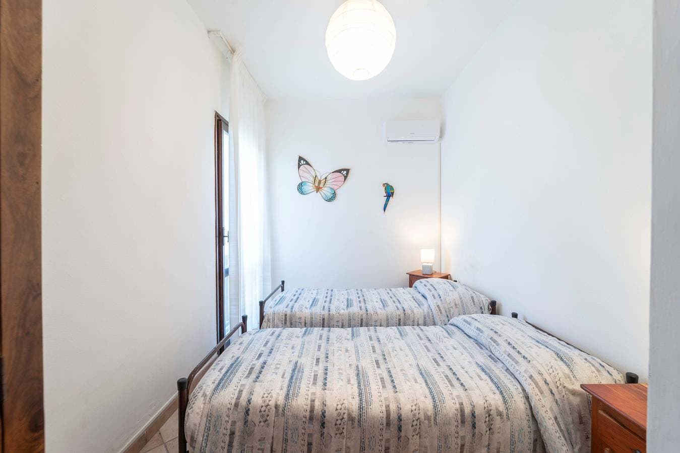 Foto 9 von 27: Appartement "Stintino Sea Front Apartments B" mit Meerblick, Balkon und gemeinsamem Garten
