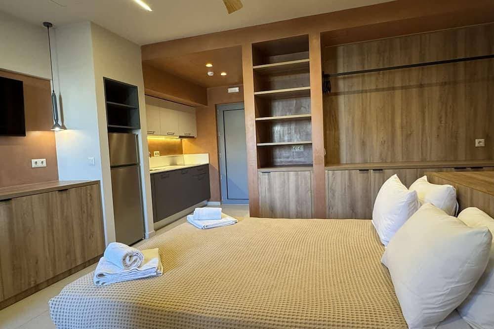 Foto 4 von 16: Modern Deluxe Triple Studio – Comfort & Style for Three