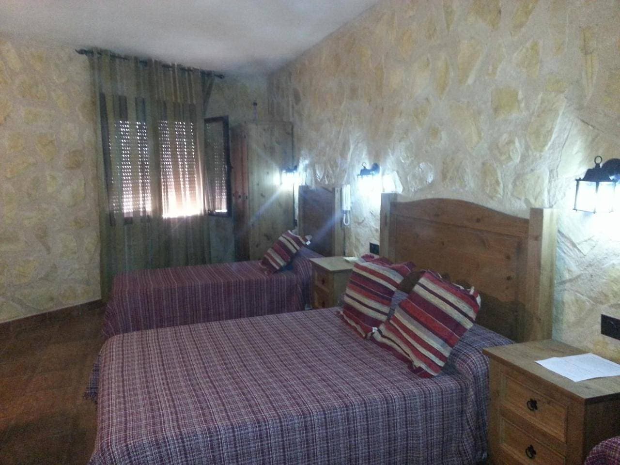 Foto 6 von 27: Quadruple Room