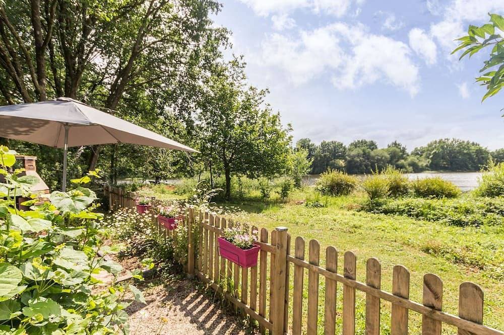 Foto 8 von 21: Ferienhaus am See mit eingezäuntem Garten, Kamin und WLAN in Joué-sur-Erdre