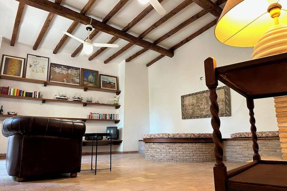 Foto 4 von 17: Septà - Pittoresca Casa Vacanze nel Centro Storico Vista Lago, Piccolo Giardino