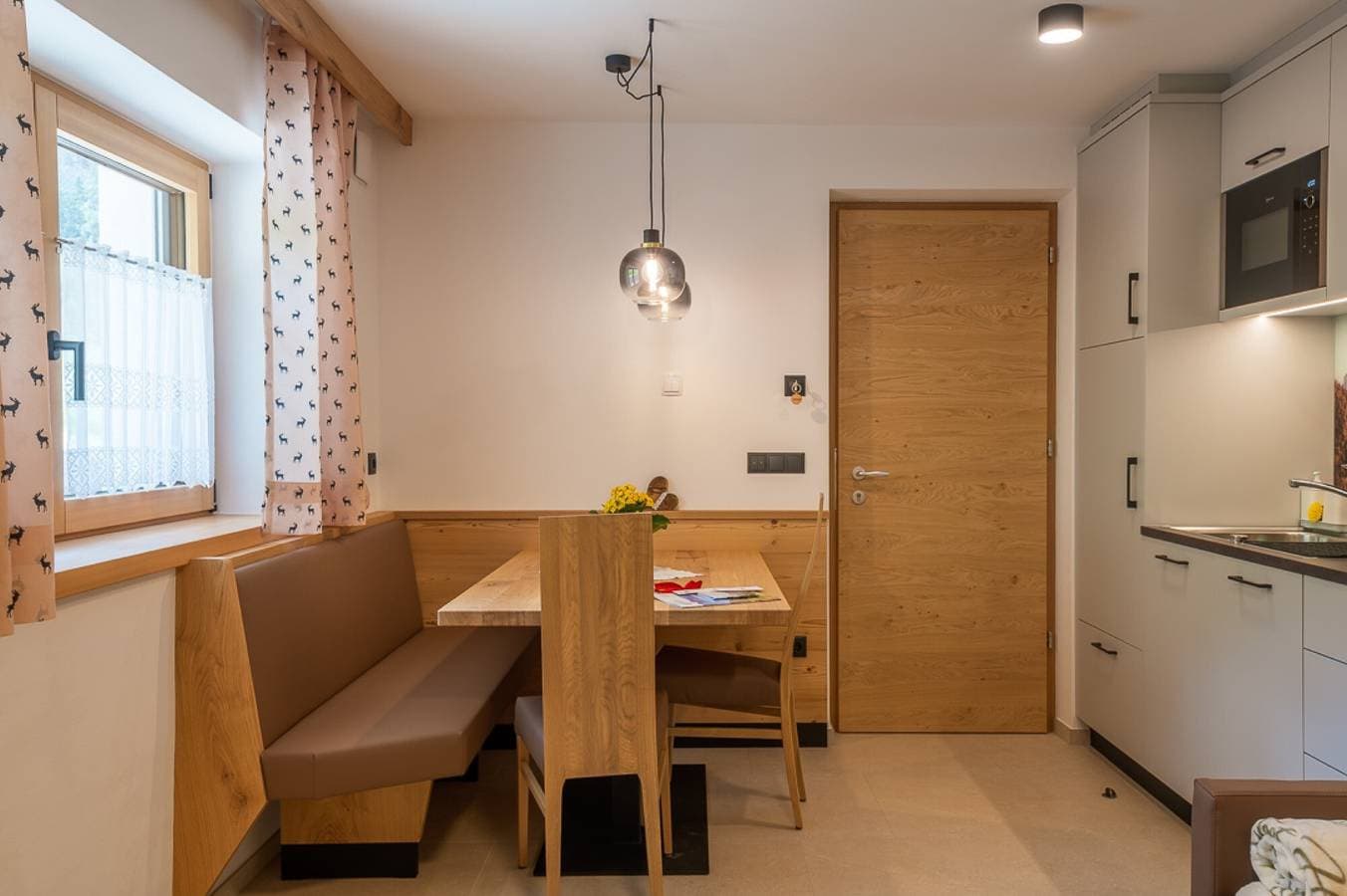 Foto 8 von 34: Ferienwohnung "Planerhof Apartment Alpenrose" mit Bergblick, Gemeinschaftsterrasse und WLAN