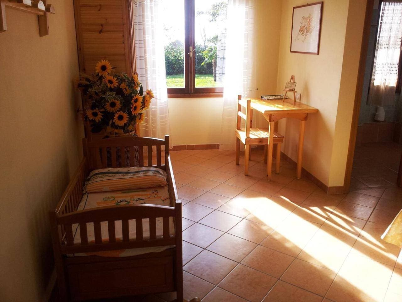 Foto 10 von 19: Quadruple Room with Garden View