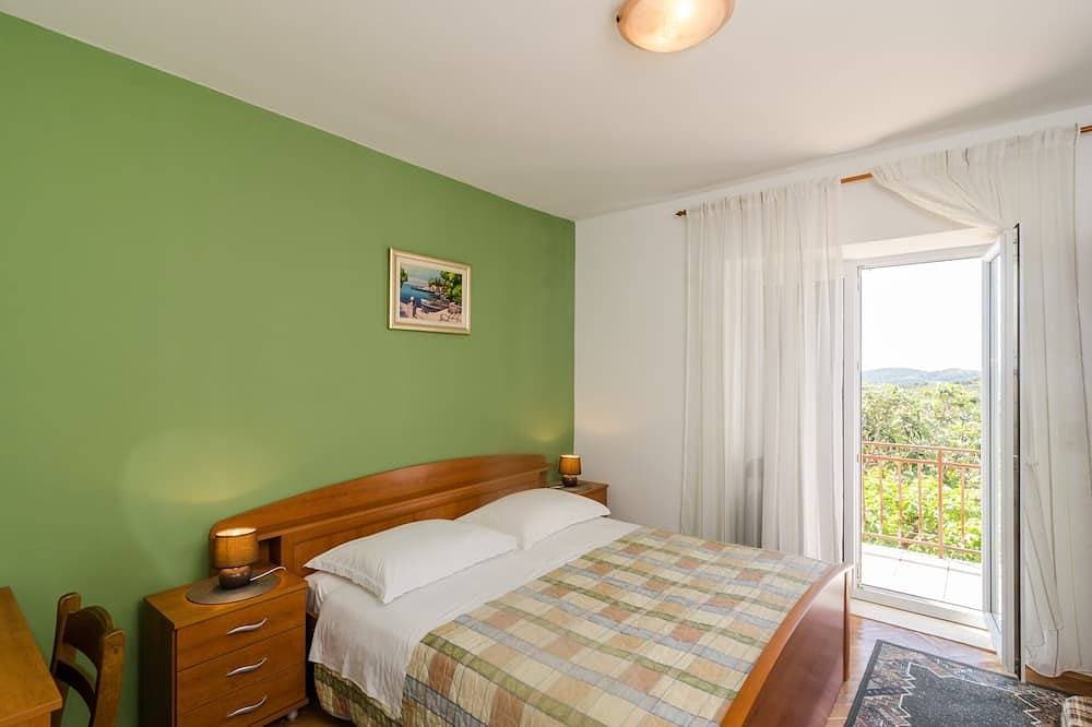 Foto 2 von 17: Guesthouse Moretic - Suite mit 2 Schlafzimmern, Balkon und Meerblick