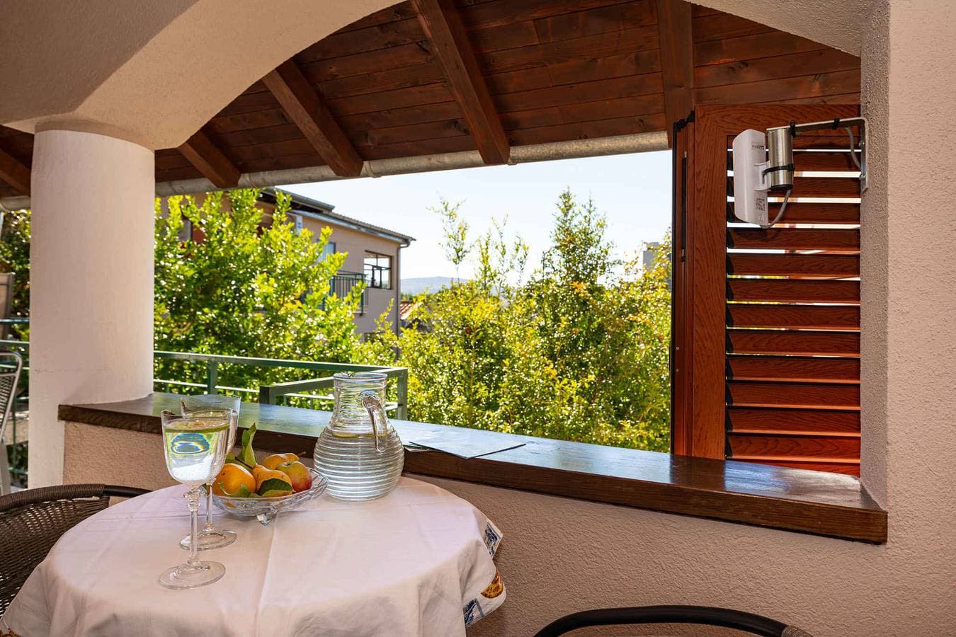 Foto 4 von 35: Ferienwohnung mit Terrasse und Klimaanlage