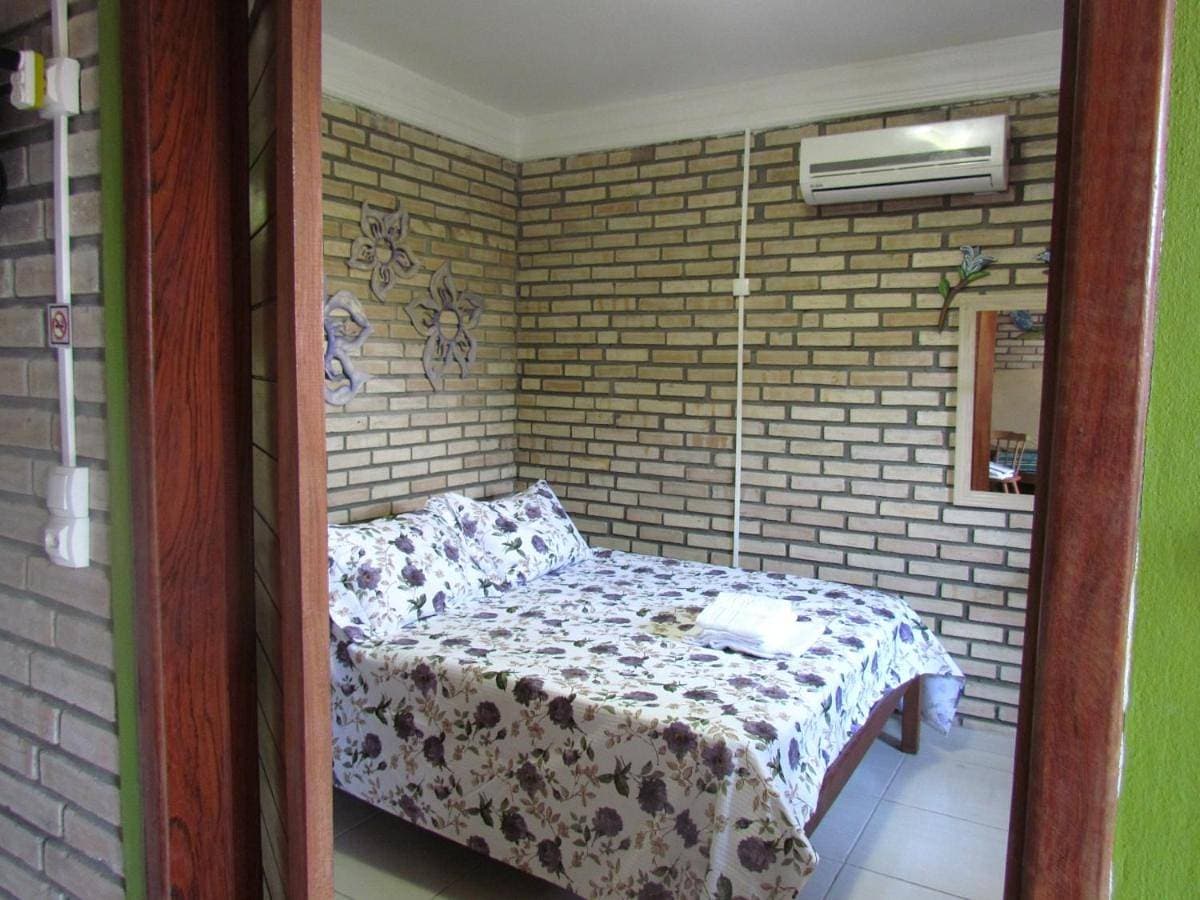 Foto 4 von 19: Economy Room with Shared Bathroom