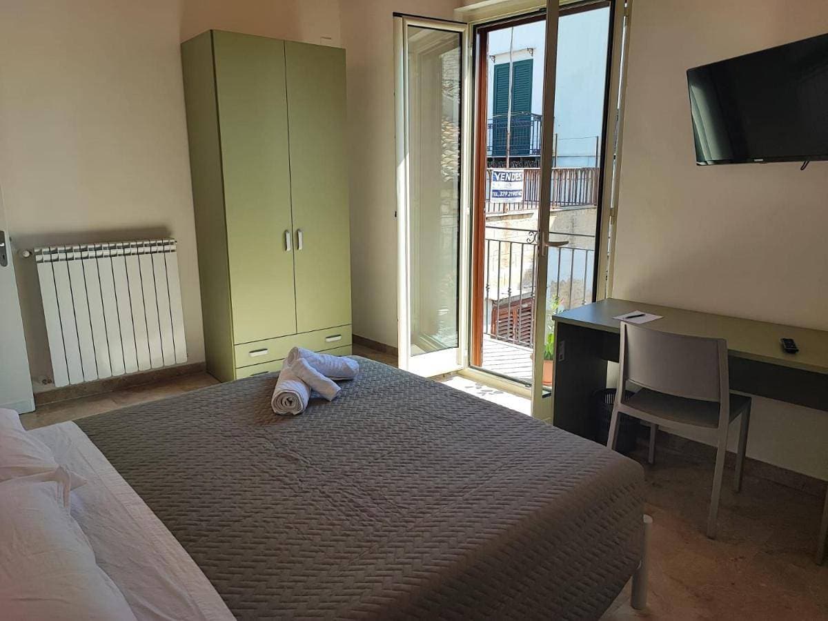 Foto 2 von 8: Triple Room with Terrace