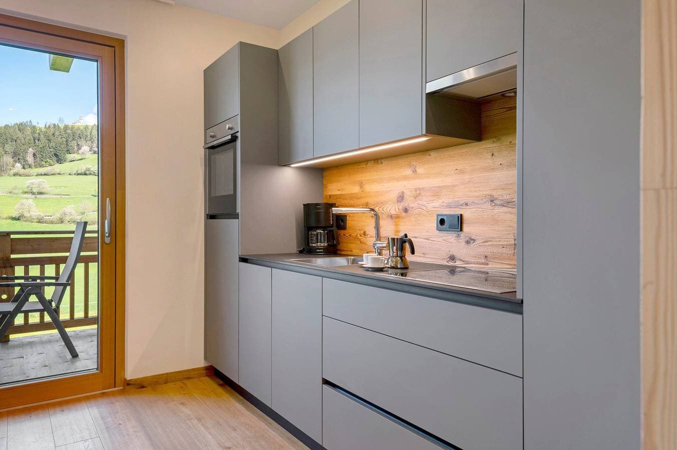 Foto 8 von 39: Ferienwohnung 'Baumannhof Apartment Aria' mit Bergblick, Gemeinschaftsterrasse und Wi-Fi