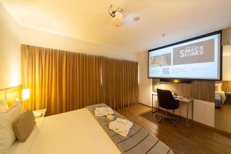 Foto 8 von 18: Smart Cine - 1 Queen Bed