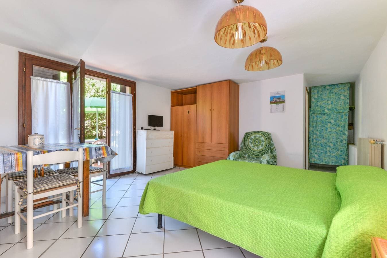 Foto 4 von 19: Einzimmerapartment 'Monolocale Nel Verde' mit Privatterrasse, Gemeinschaftsgarten und WLAN
