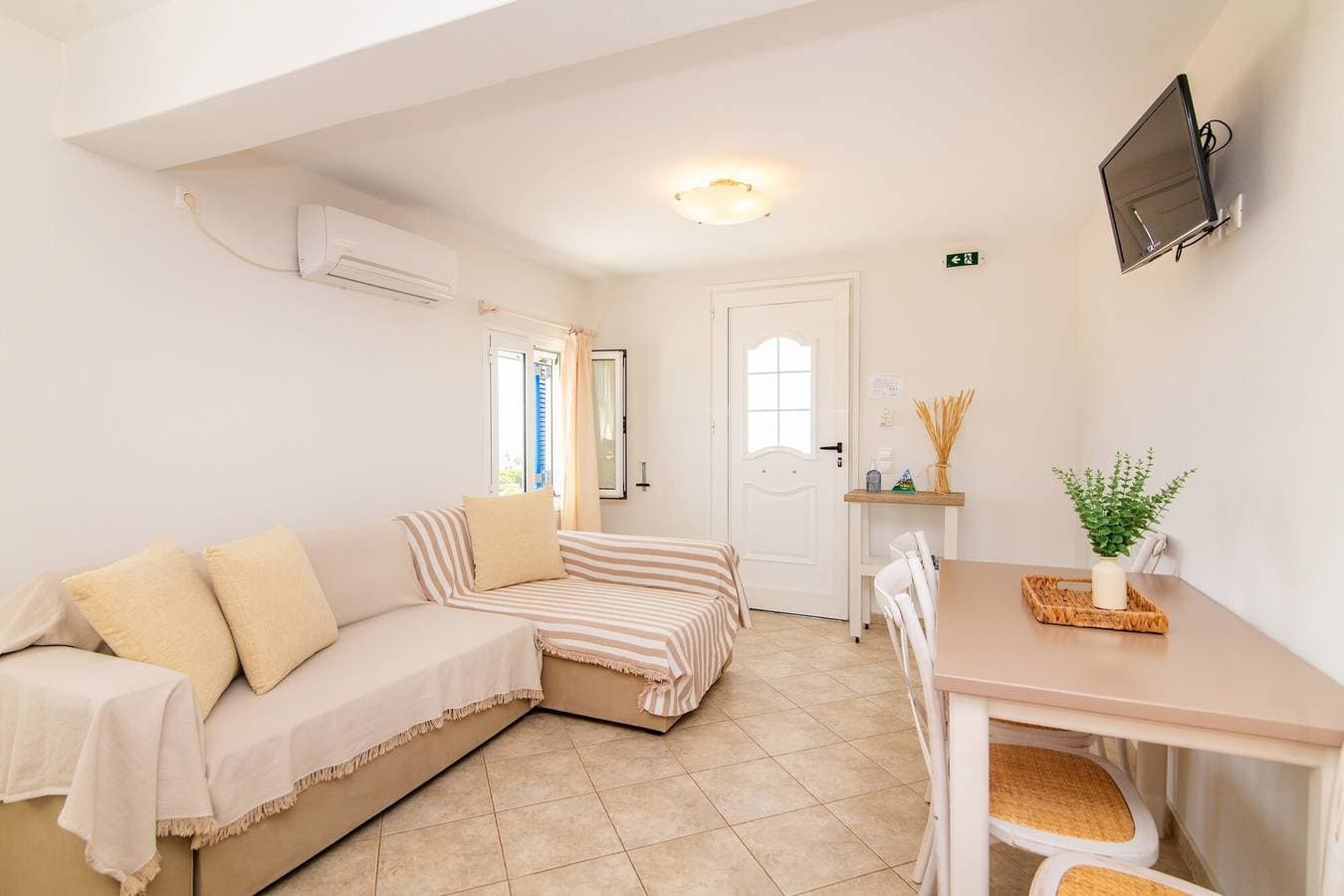 Foto 7 von 24: Ferienhaus 'Anemologio 302 Tinos' mit Meerblick, WLAN und Klimaanlage