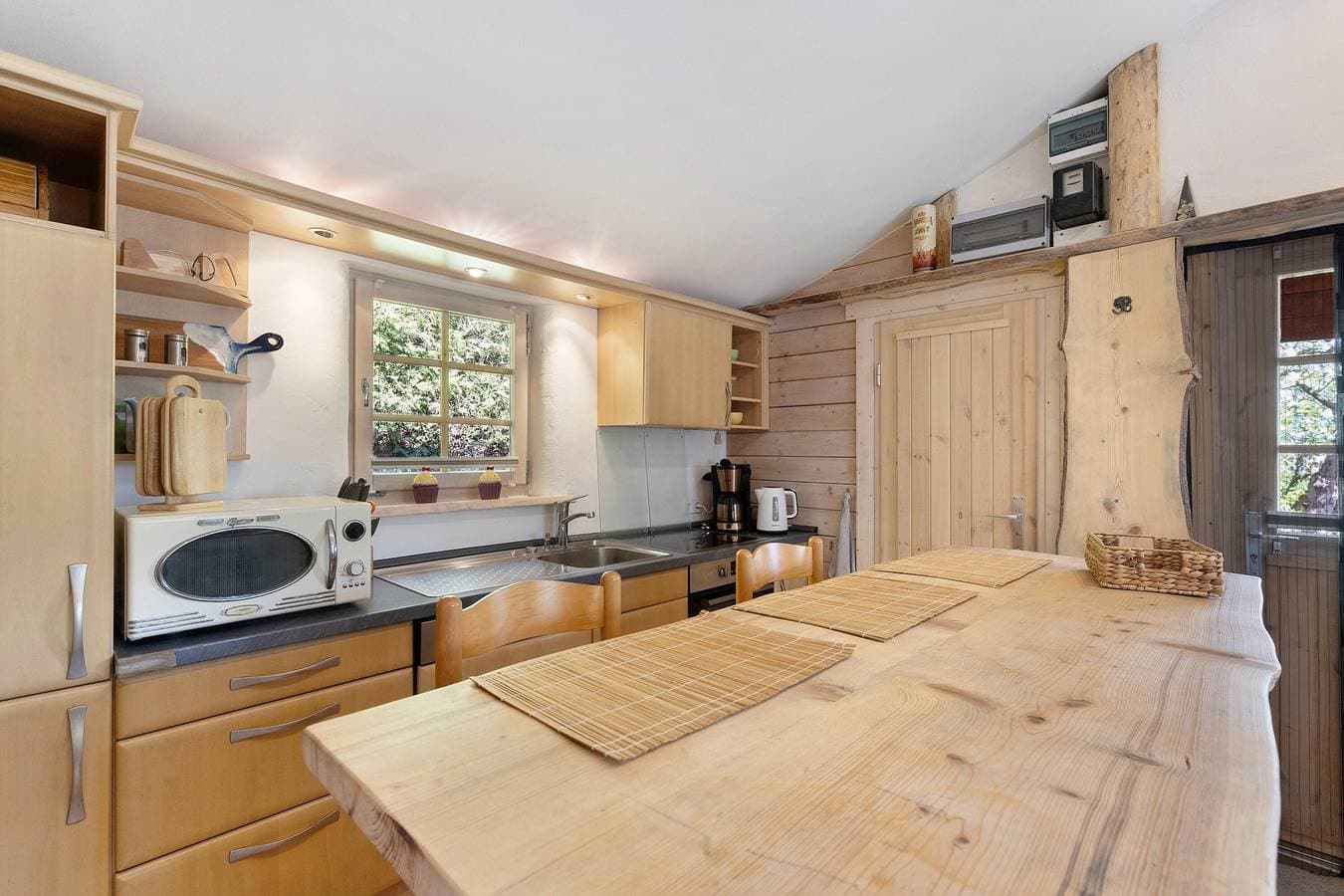 Foto 9 von 30: Ferienhaus 'Blockhütte' mit privater Terrasse und privatem Garten