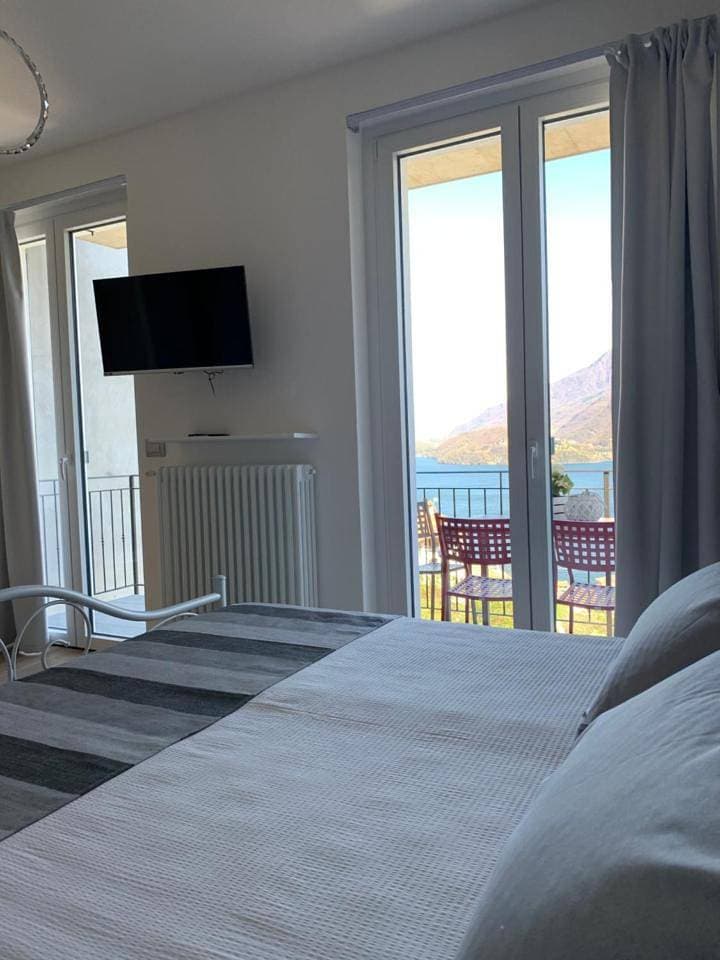 Foto 9 von 13: Quadruple Room with Lake View