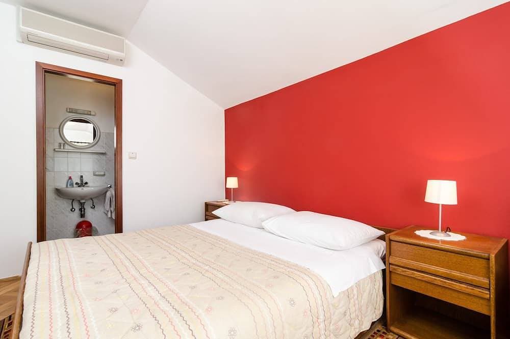 Foto 2 von 16: Guesthouse Moretic - Doppelzimmer mit Gartenblick 3