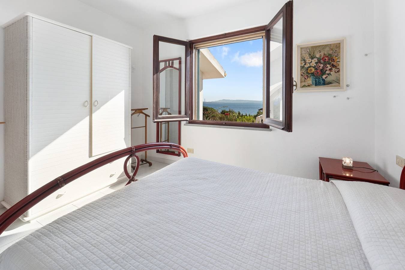 Foto 11 von 28: Ferienwohnung 'Carloforte' mit Meerblick, privater Terrasse und privatem Garten