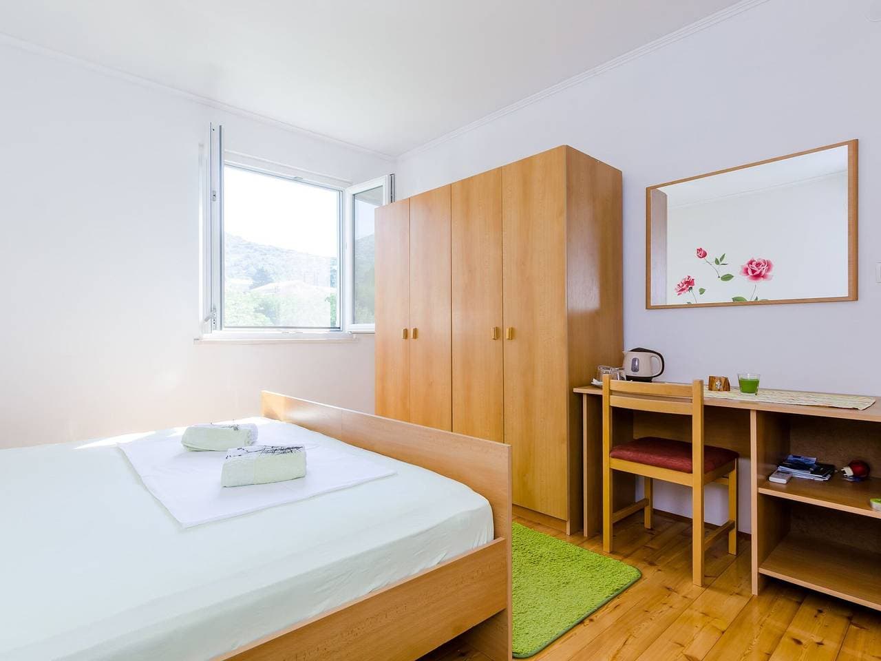 Foto 5 von 23: Apartment & Rooms Maždin - Triple Room with Mountain View ( Soba Standard )