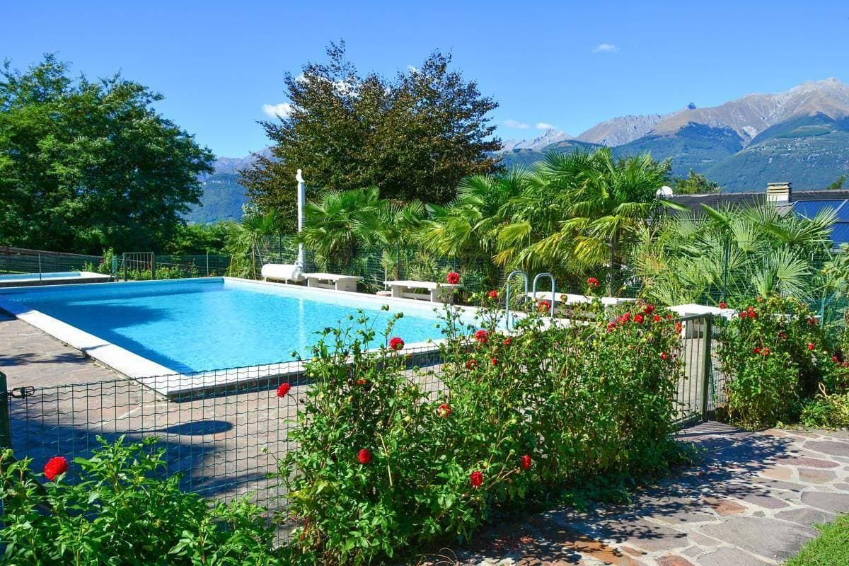 Foto 12 von 31: Sole 4 Garten-Ferienwohnung mit Pool