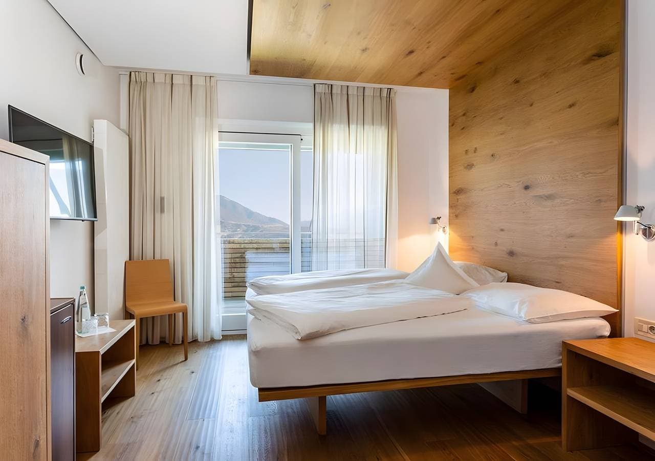 Foto 7 von 30: Zimmer 'Doppia Vista Panoramica Sup 102' mit Bergblick, WLAN und Klimaanlage