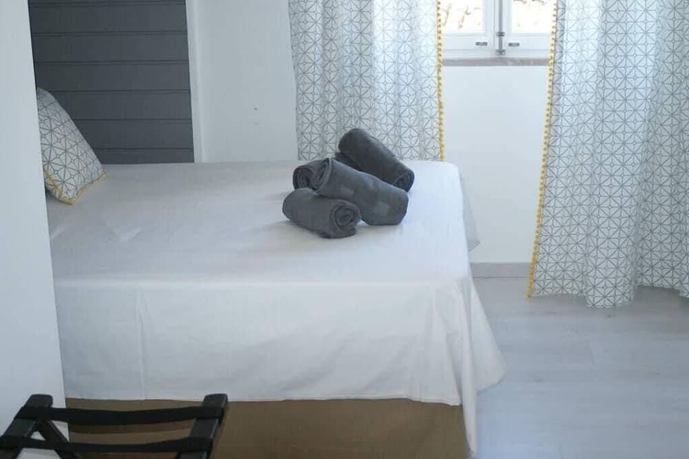 Foto 10 von 27: Double room fist floor (insuite) - Casa do Postigo