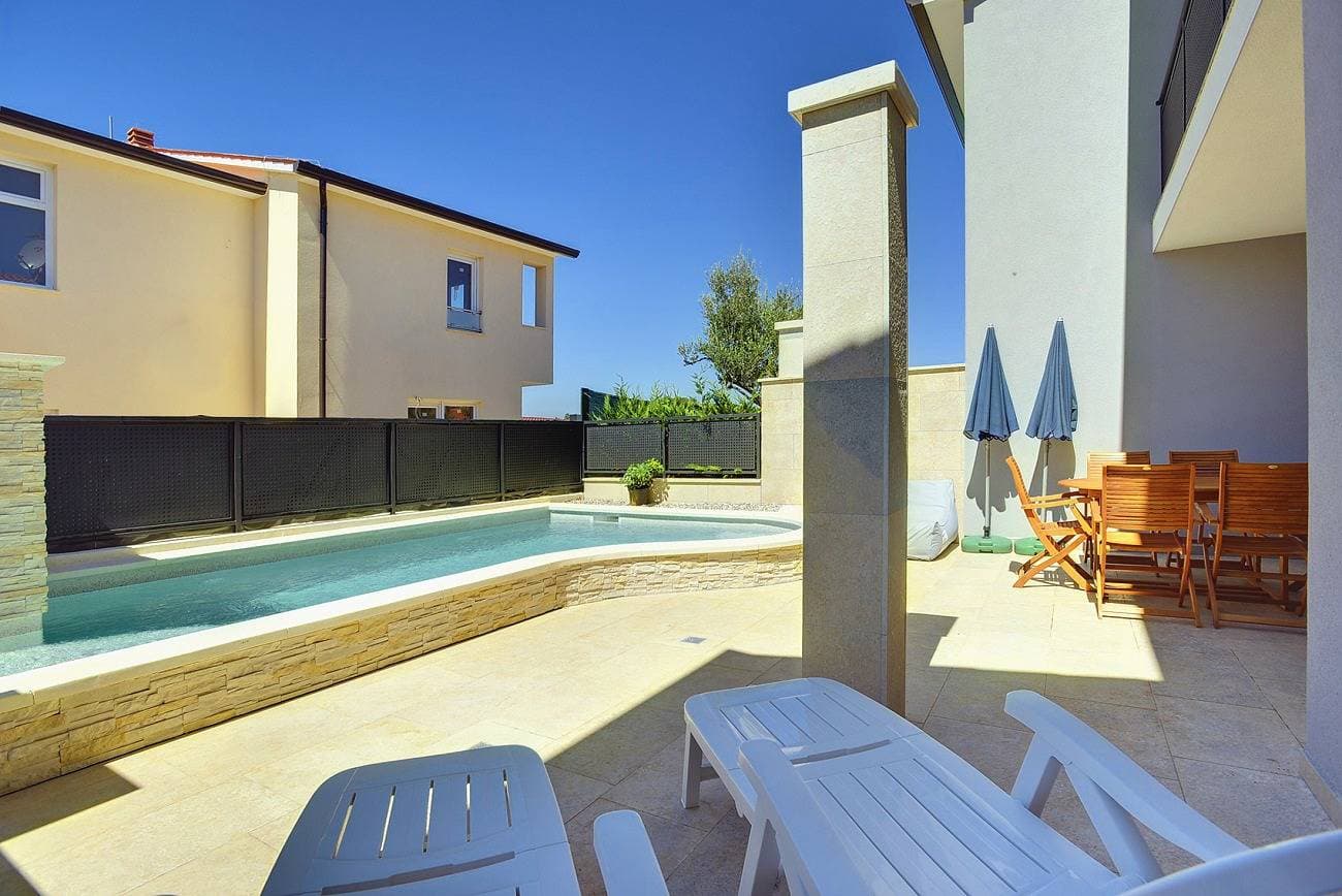 Foto 4 von 22: Strandnahe Villa mit privatem Pool, WLAN, Terrasse, Grill