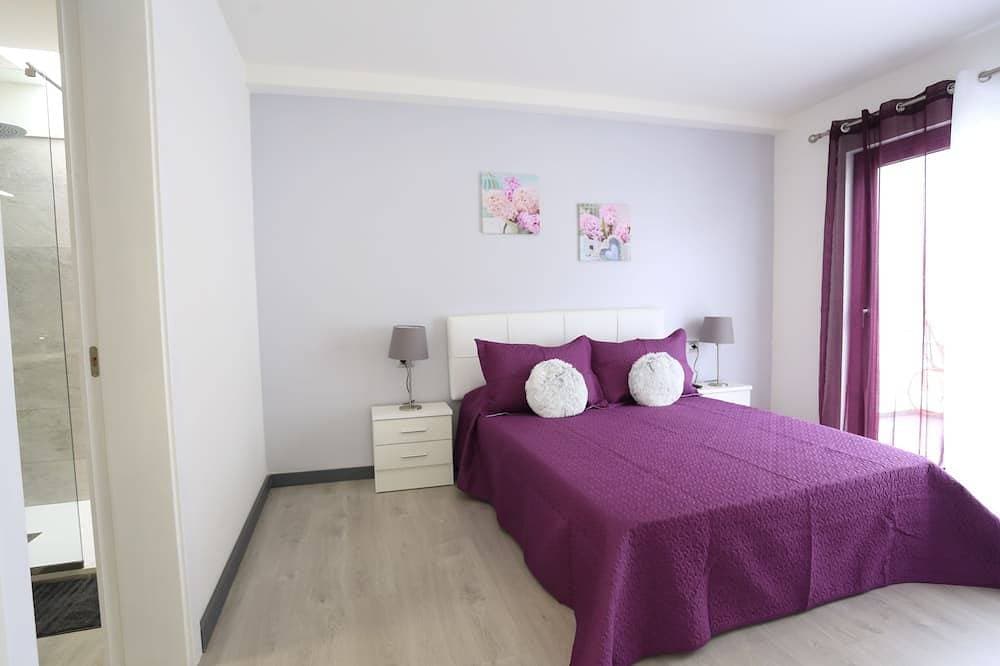 Foto 5 von 30: Einzelhaus mit 3 Schlafzimmern, 3 Bädern, Wohnzimmer, Küche, Garten