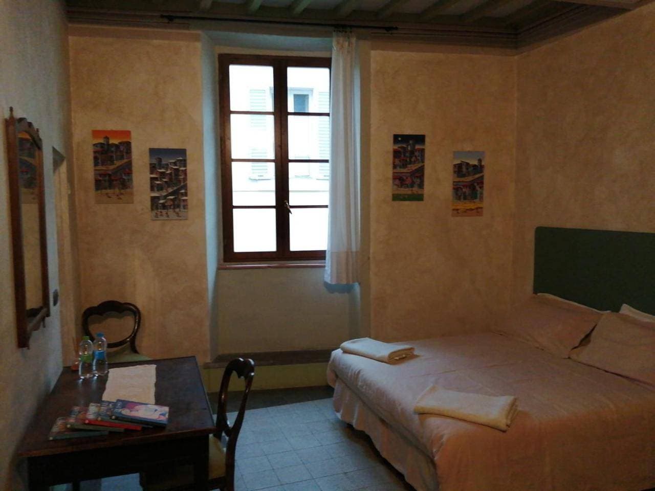 Foto 9 von 12: Triple Room with Private Bathroom