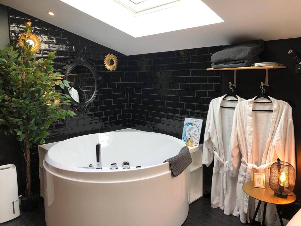 Foto 5 von 12: Deluxe Suite with Spa Bath