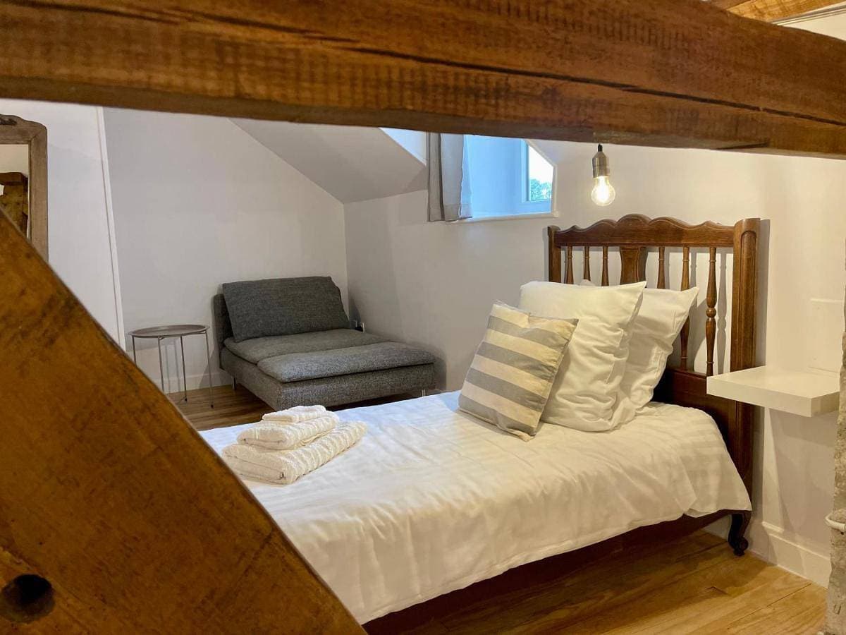 Foto 4 von 22: Quadruple Room with Garden View