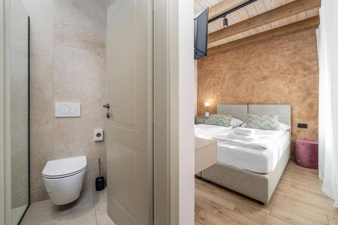 Foto 6 von 14: Twin Room with Private Bathroom