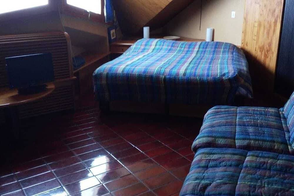 Foto 3 von 24: Wohnung mit Zwischengeschoss und Kamin