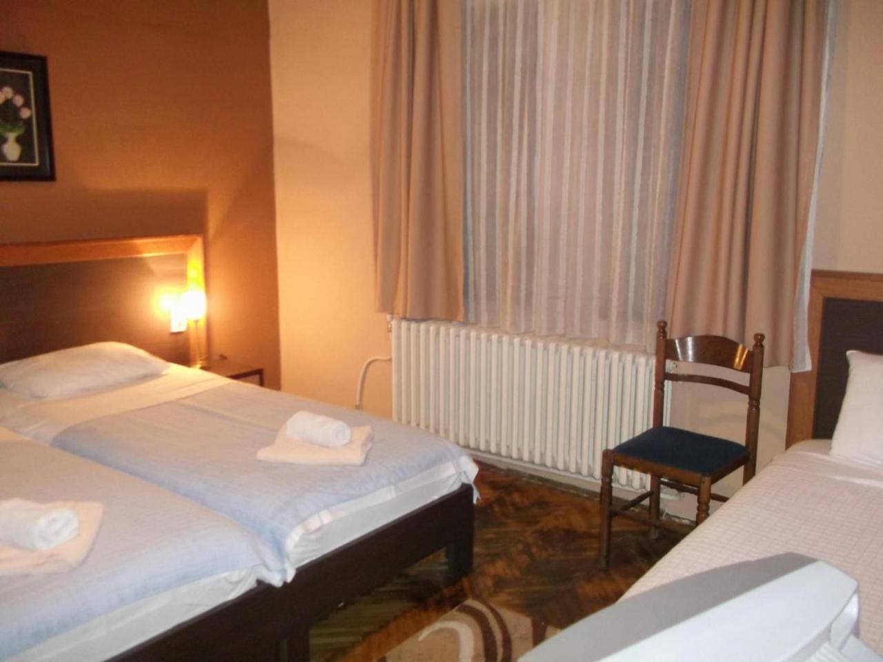 Foto 9 von 16: Triple Room