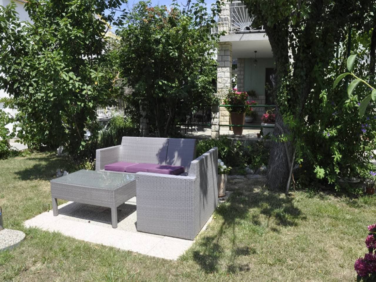 Foto 12 von 14: Ferienwohnung für 6 Personen mit Garten