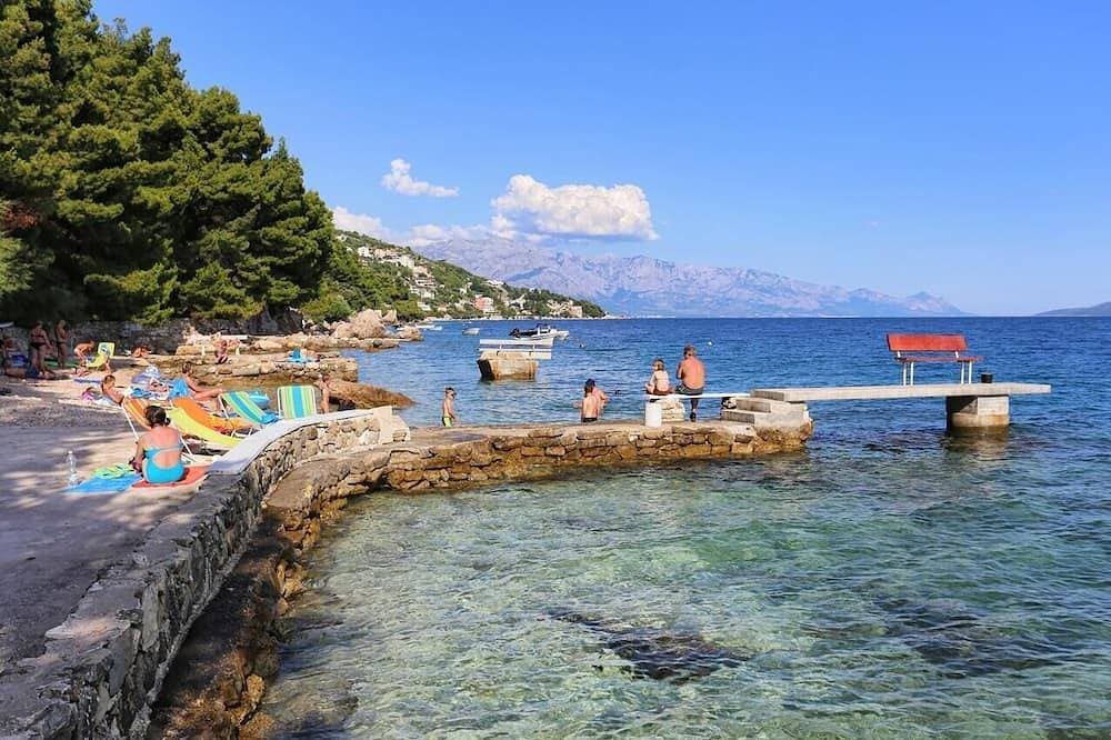 Foto 6 von 17: 2-Zimmer-Ferienwohnung mit Pool am Strand Zavode, Omis