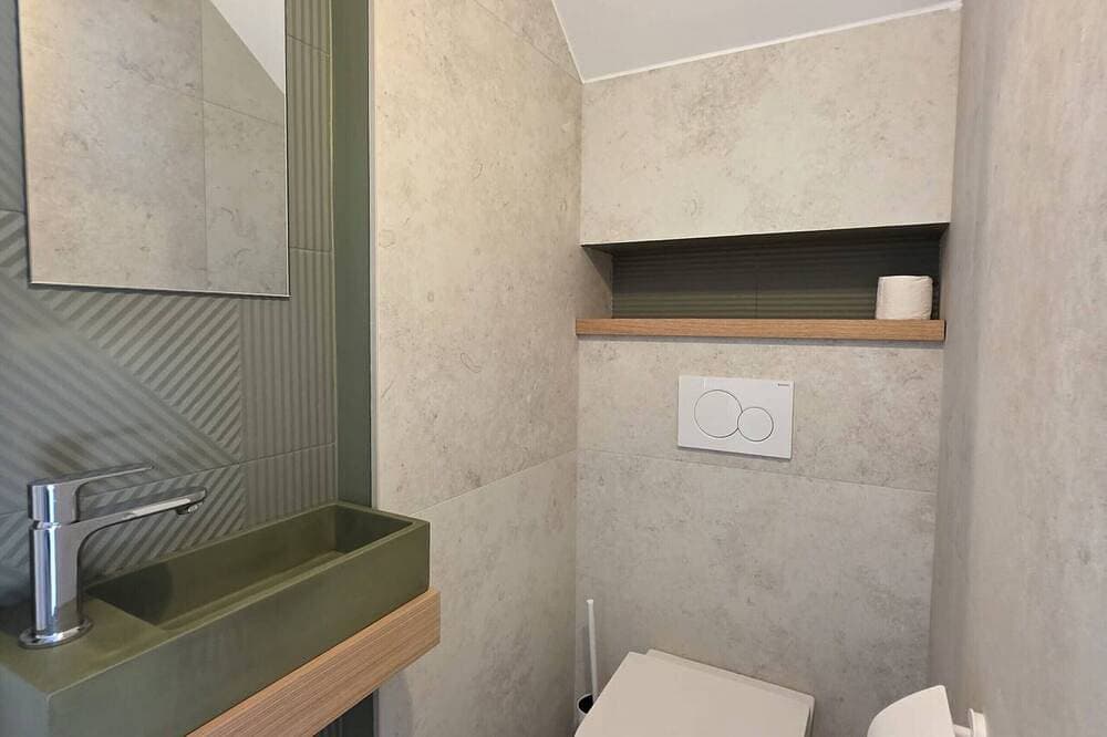 Foto 10 von 30: Elegant new villa just steps from the beach - Air conditioning