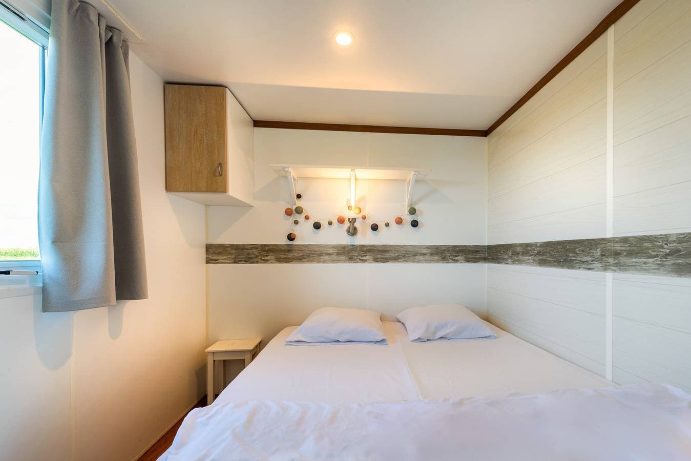 Foto 11 von 24: Mobilheim 'Ty Reuniou' mit Meerblick, privater Terrasse und eigenem Garten