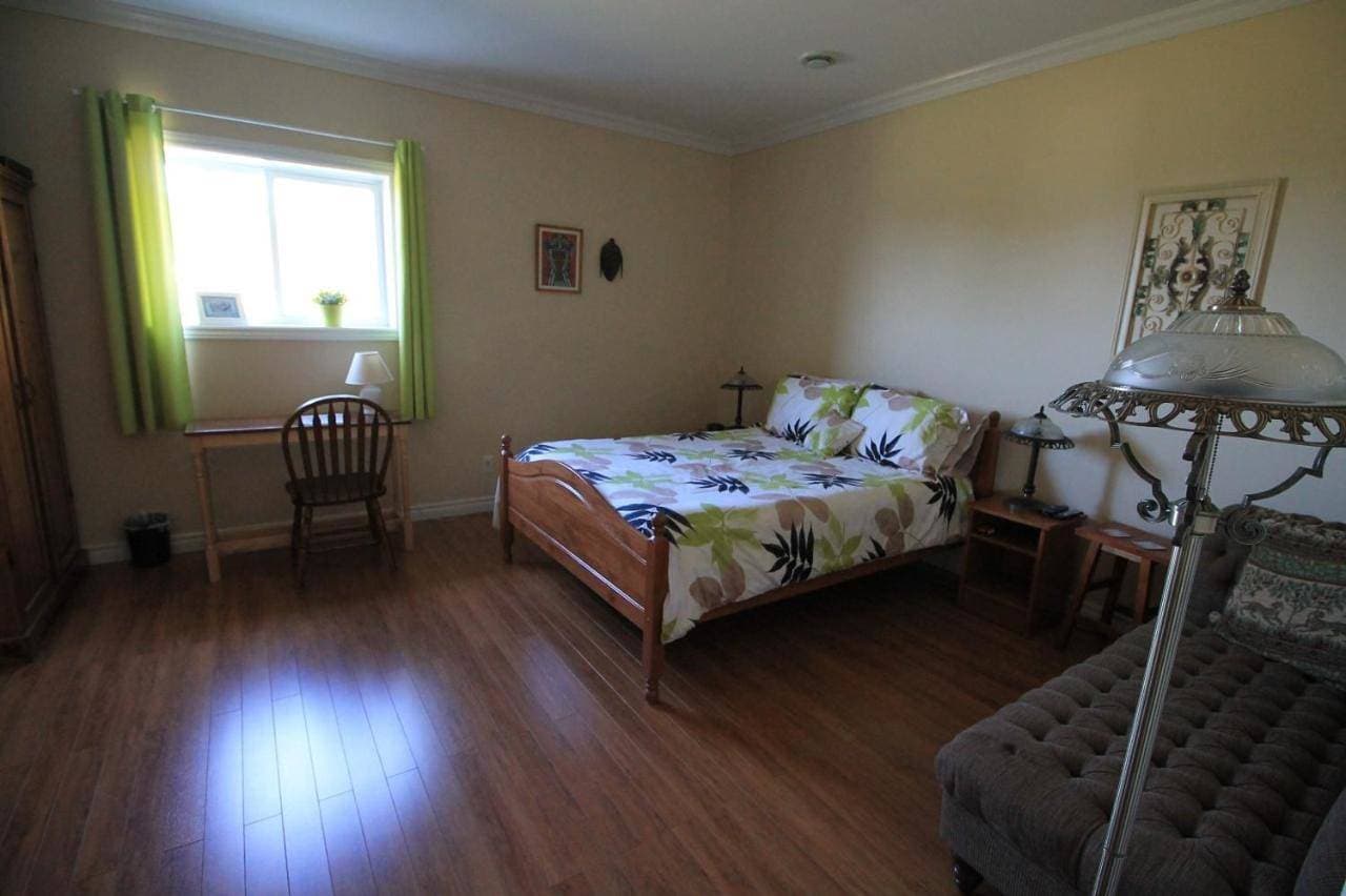 Foto 3 von 11: Triple Room with Garden View